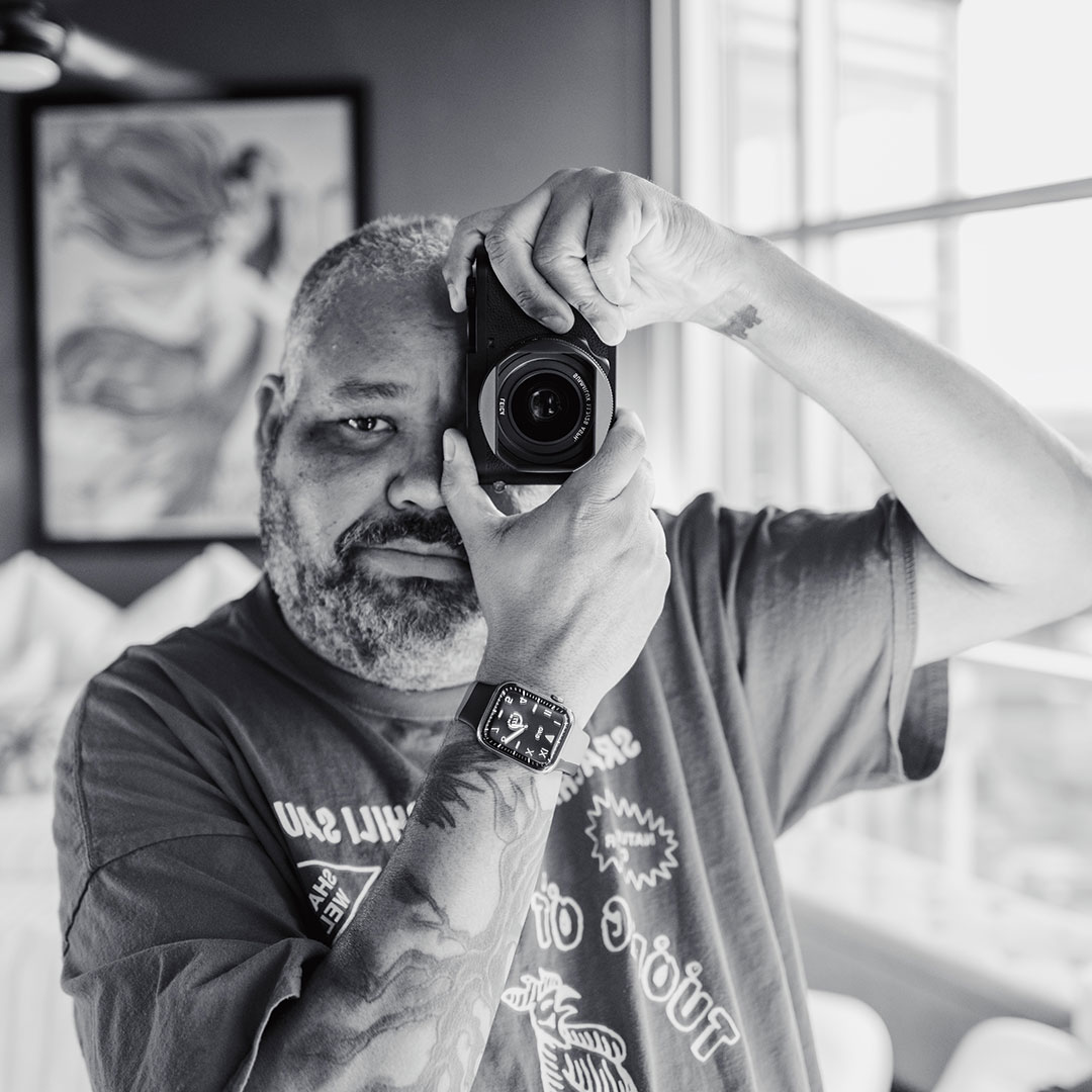 Chet Yeary II holding a Leica Q2 Monochrom